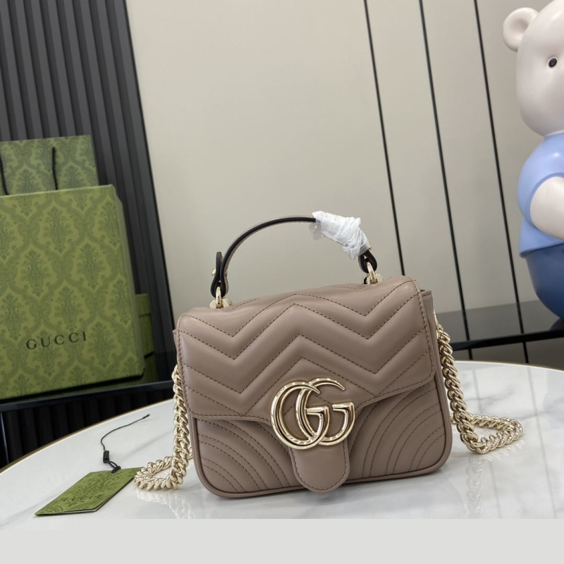 G*u*i top handle bags